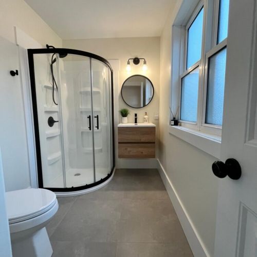 Enjoy a spa-like experience in this stylish, modern bathroom—fresh, clean, and designed for your comfort.