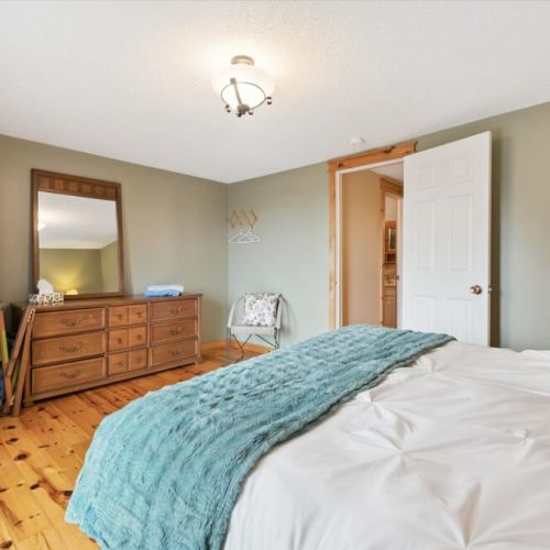 Bedroom 1: Wake up to natural light and peaceful outdoor views