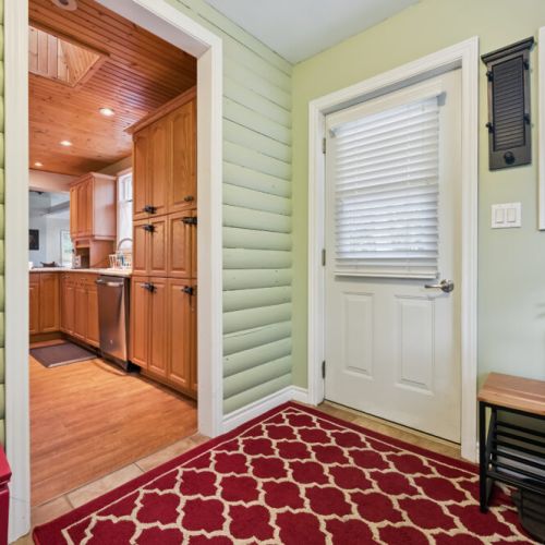 Convenient main entrance with quick access in and out for beach days or winter adventures.