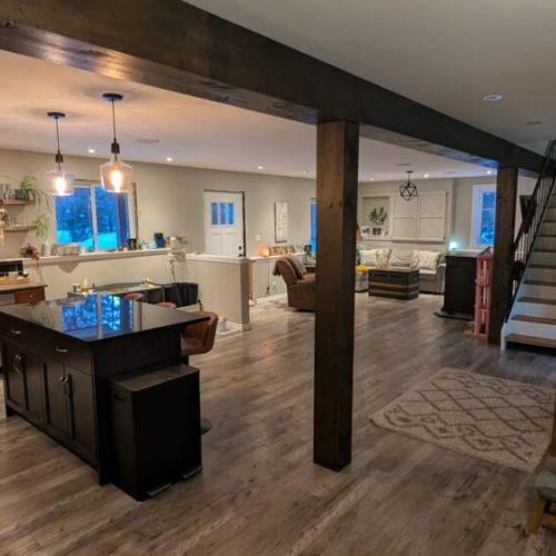 Spacious open layout connecting the kitchen, dining, and living areas — perfect for gathering.