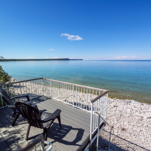 Relax on the private waterfront deck perched just steps above the crystal-clear waters of Georgian Bay.