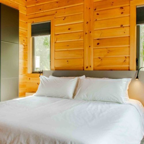 Spacious bedroom with king bed and natural light—the perfect retreat.