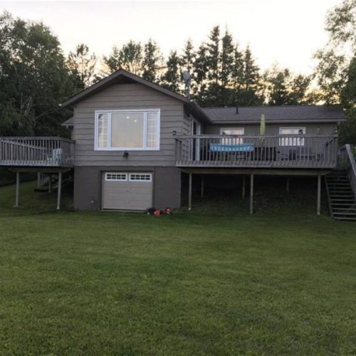 Whether it's a casual meal, a lively BBQ, or a quiet evening by the firepit, the backyard serves as a versatile outdoor haven, accommodating various activities for every mood and occasion.