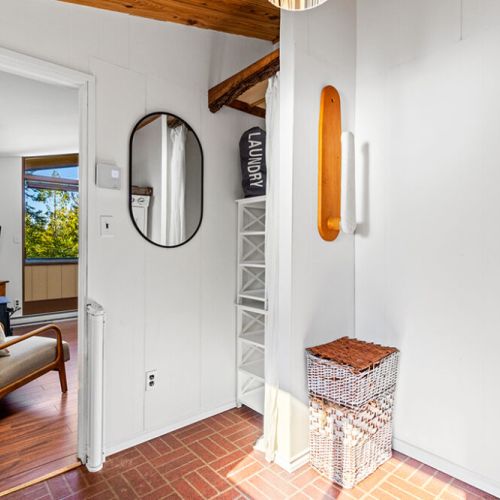 Bright entryway welcomes you inside with thoughtful storage and easy access to the cottage.