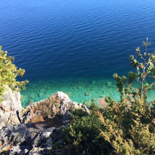 Crystal-clear depths seen from the cliffs of the Bruce Peninsula.