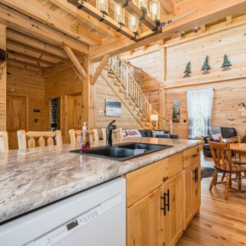 The kitchen island with sink is the perfect place to entertain friends and family, with access to the Great room just steps away.