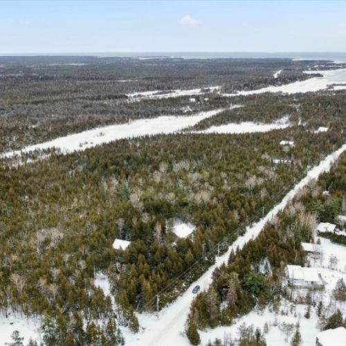 Wide aerial view highlighting the secluded location and quiet rural surroundings