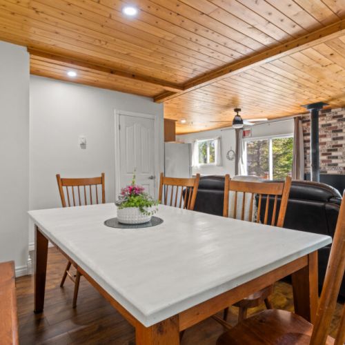 Gather around the dining table for meals, games, and great conversation.