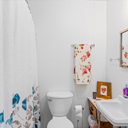 The updated full bathroom includes a shower/tub combination and all the essentials for your stay.