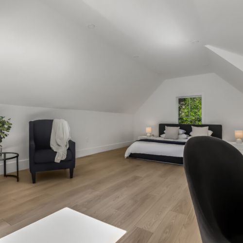 Loft bedroom area with extra space to spread out and unwind.