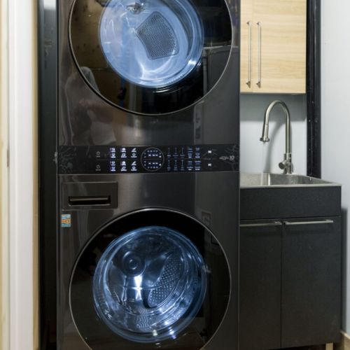 Washer/Dryer:
Make yourself at home with the convenience of a fully automatic LG washer and dryer. Featuring multiple settings, this modern appliance ensures your clothes are clean and fresh throughout your stay.