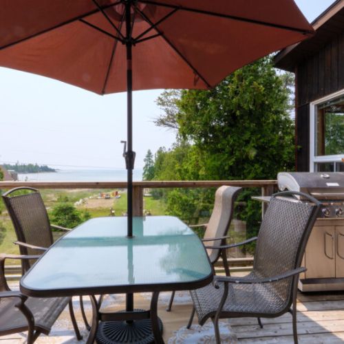 Get your grill on with a grand view of the water off of the rear deck.