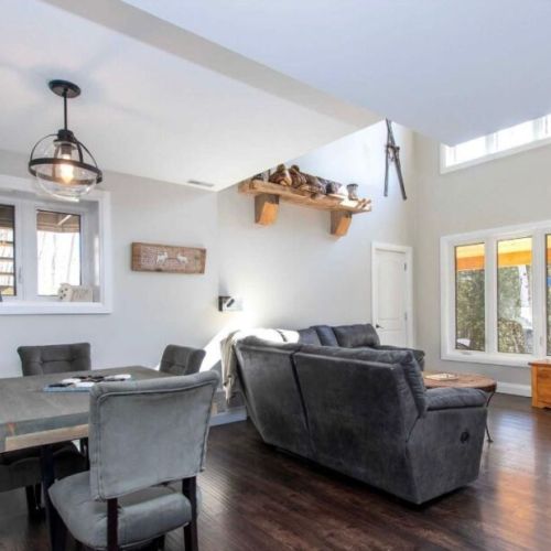 Open dining and living area perfect for family meals and gatherings.