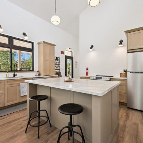 Fully equipped kitchen with a large island perfect for cooking and chatting.