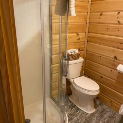 Fresh and functional—modern bathroom with glass shower and all the essentials.