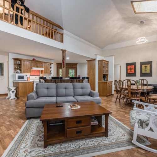 The large open concept living space is perfect for entertaining and lounging. It is ground central for your family's activities. You can access the large wrap-around veranda deck from two locations.