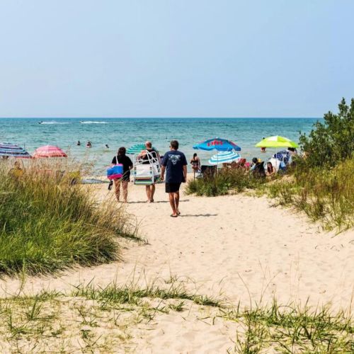 Sauble and Red Bay beaches are just a short distance away. Location is paramount, with the property's proximity to attractions like Howdenvale Beach, a 9-minute walk to sandy shores on Lake Huron, and less than 20 minutes from Lion's Head, Sauble Beach, and Wiarton.
