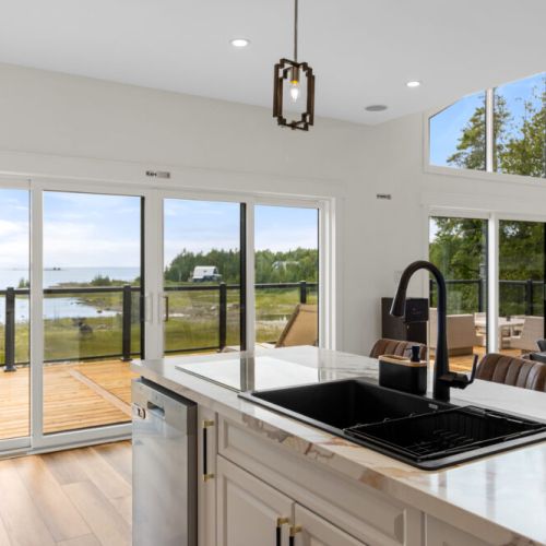 Prepare meals while enjoying beautiful views of Hay Bay through the expansive windows.