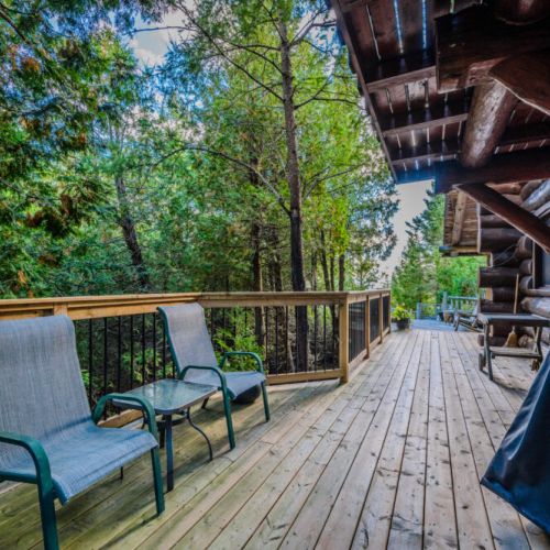Relax on the spacious deck, surrounded by nature. Enjoy the fresh air, comfortable seating, and serene views—ideal for morning coffee or unwinding after a day of adventure.