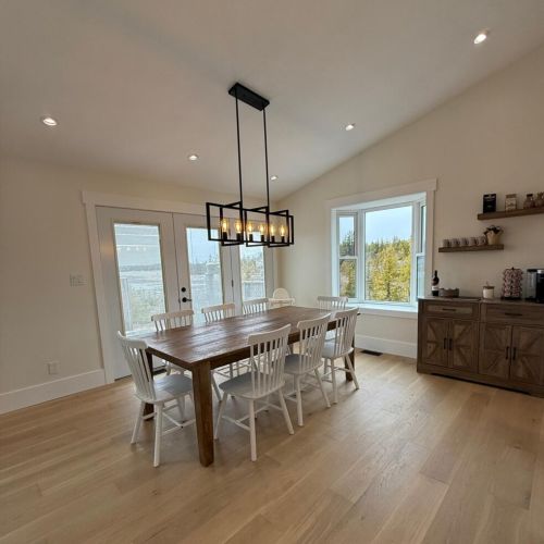 Gather around the farmhouse table for memorable meals with loved ones—comfort and style in your ideal rental retreat.