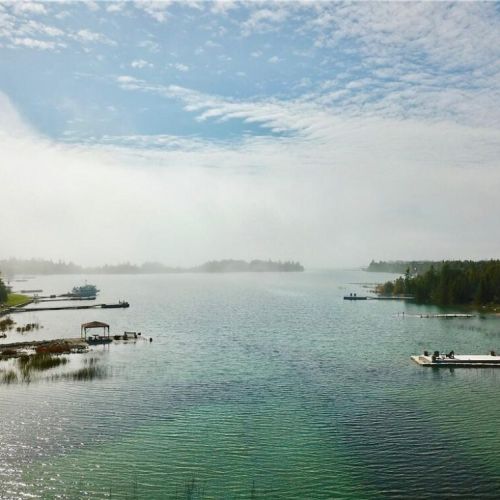 Wake up to serene morning views of crystal-clear water and the quiet shoreline stretching out across Lake Huron.