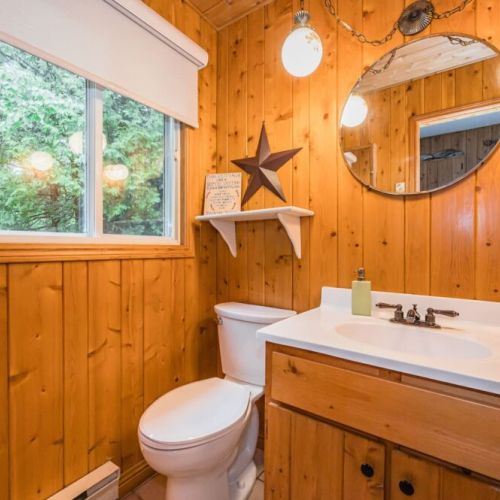 The cozy main floor bathroom with shower.