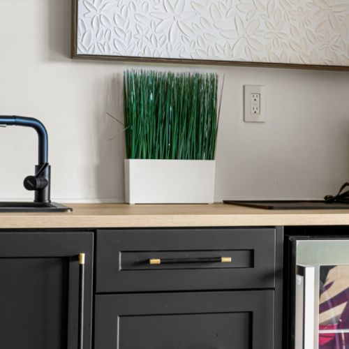 Modern cabinetry and thoughtful finishes add warmth throughout the home.