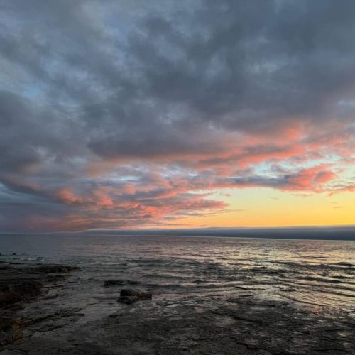 Witness breathtaking Lake Huron sunsets just minutes from the cottage—ideal for romantic evenings or peaceful moments during your Bruce Peninsula escape.
