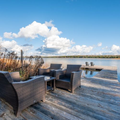 An ideal spot for quiet contemplation, morning coffee, or evening conversations as the water reflects the changing colors of the sky.