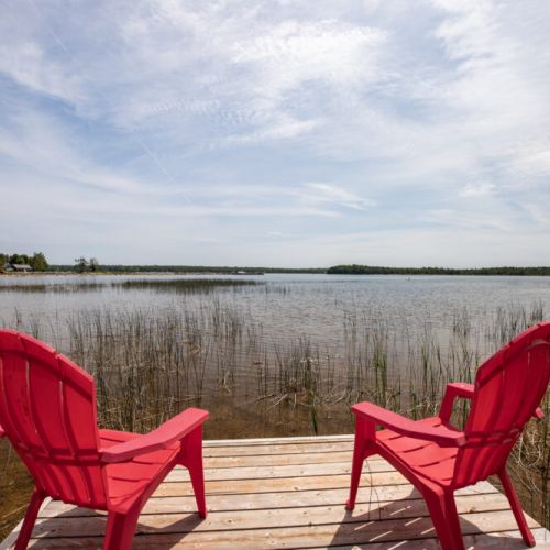 Your private dock is made for sunbathing reading and watching the water go by.