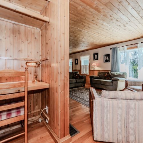 A quiet pine-paneled workspace with Wi-Fi—great for digital nomads or catching up on work between adventures.