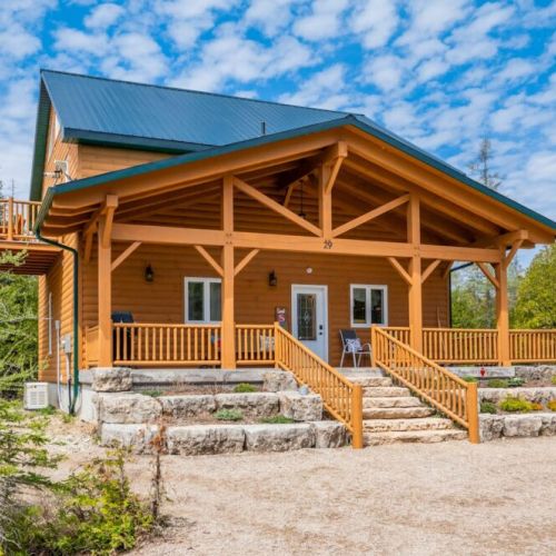 Saw N' Logzz is a stunning custom built private log cabin in the Pike Bay community. Enjoy a day of hiking, swimming, or boating to return to a relaxing and gorgeous property.