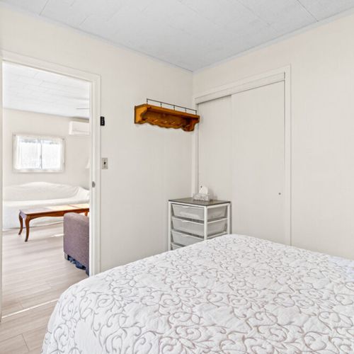 A comfortable main-floor bedroom offering a quiet place to recharge after a day of exploring.