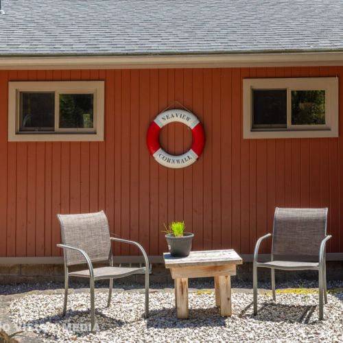 Cozy sitting area outside the cottage—an ideal spot to enjoy the fresh forest air.
