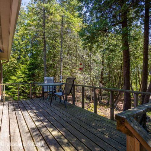 Deck space surrounded by cedars—your front-row seat to the woods and lake air.