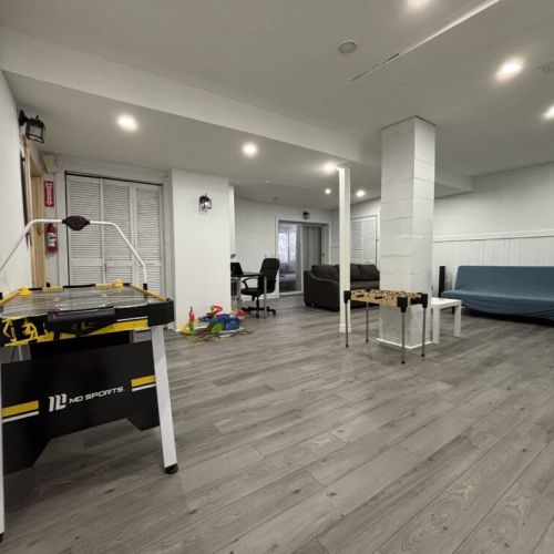 Enjoy endless entertainment with air hockey, foosball, and lounge space—perfect for family vacations, group getaways, and rainy-day fun at your cozy retreat.