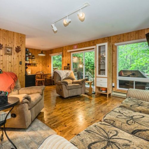 An incredibly cozy and rustic living area perfect to enjoy quality time with friends and family.
