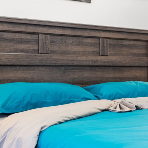 Rest easy in a spacious bedroom designed for comfort and relaxation.
