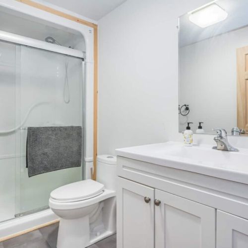 Main floor 4-piece washroom with all of the essentials, where practicality is as much a priority as comfort.