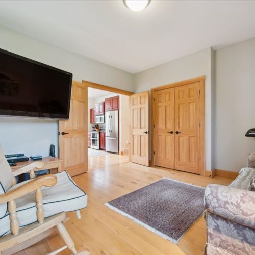 Cozy sitting area with TV and comfortable space to unwind indoors.