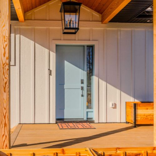 Sunny and stylish cottage entrance with a modern coastal vibe. Perfect for your next vacation rental stay—inviting, peaceful, and ideal for relaxing nature getaways or weekend escapes in the heart of cottage country.