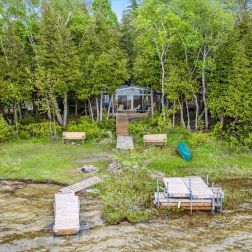 This is lakeside living at its best. With a boardwalk leading right to the deck, your days can begin and end by the water, just steps from your back door.