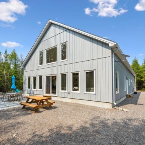 Picnic, dine, and unwind just outside the cottage, surrounded by trees and fresh air.