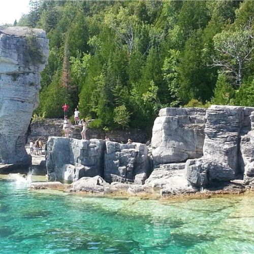 Explore the iconic Grotto and crystal-clear waters of Bruce Peninsula National Park nearby.