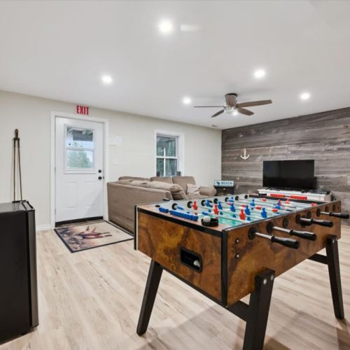 Challenge friends and family to a round of foosball in the fun basement games area.