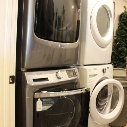 Dual stackable washer and dryer sets are onsite.