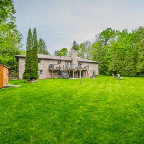 A stunning stretch of private lawn with access to the deck—plenty of space for kids to play, dogs to roam, or simply unwind in nature.