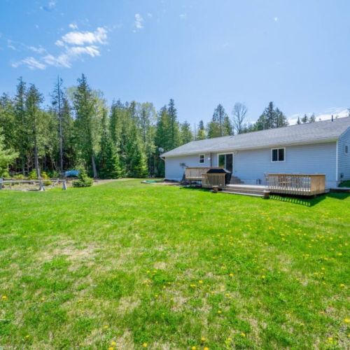 Another view of the yard with bonfire pit.