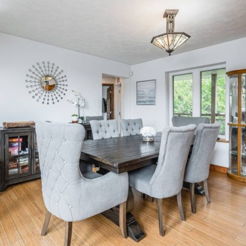 The elegantly decorated dining area, with comfortable high-backed chairs.