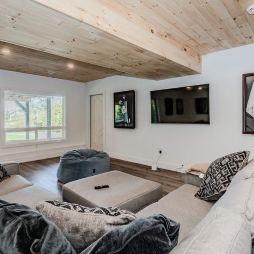 The additional seating area space is versatile and perfect for entertaining guests or enjoying family time.